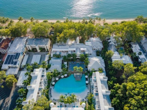 Fig Oasis—Poolside Resort Living at The Beach Club